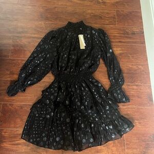 Cute black textured dress with ruching